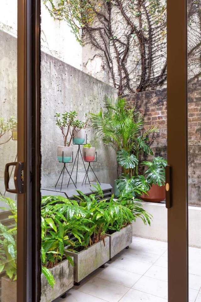 The Green Haven - Lush Industrial Chic Living Apartment